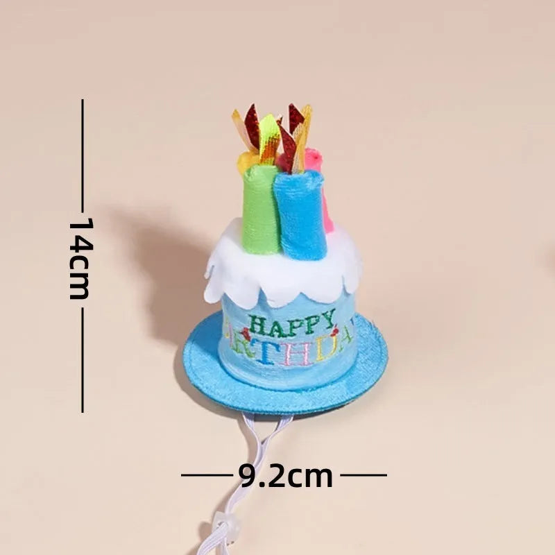 Printed polyester dog birthday hat and drool towel set in cartoon style with blue and pink colour options.