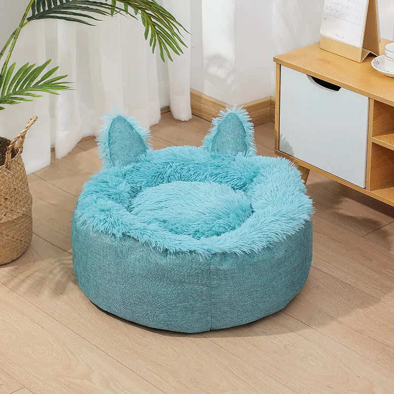 Soft faux fur plush cat bed in grey with fluffy interior – available in multiple sizes and colours for indoor use