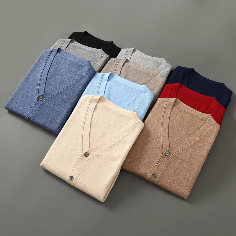 Man wearing beige Andy velvet v-neck cardigan coat with loose fit and long sleeves