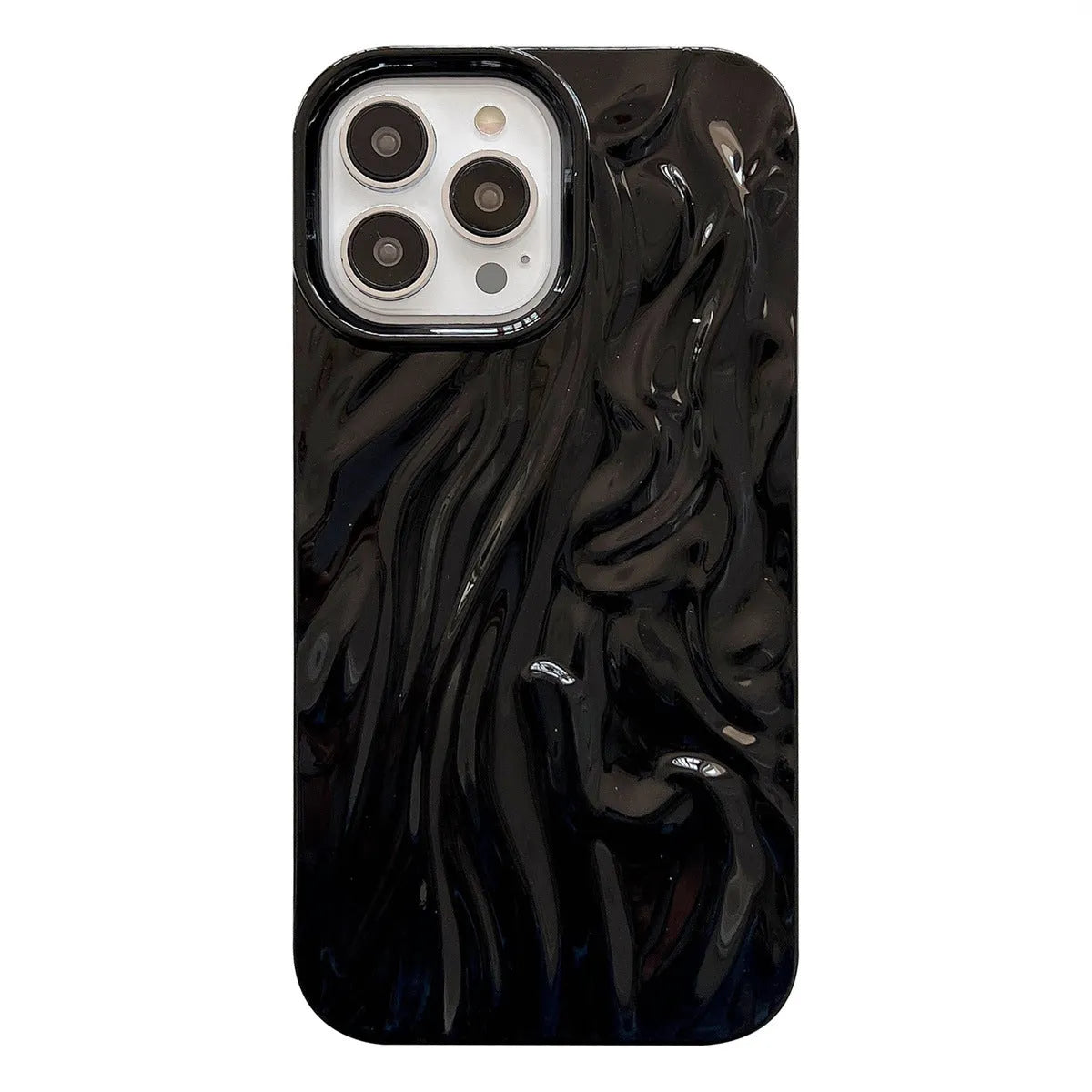Milky white silicone iPhone case with a water ripple texture on a table.