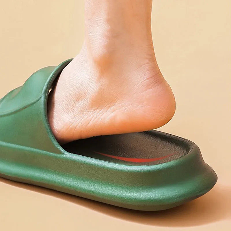 Pair of thick-soled EVA flip flop slippers in a colour option, showing non-slip tread pattern.