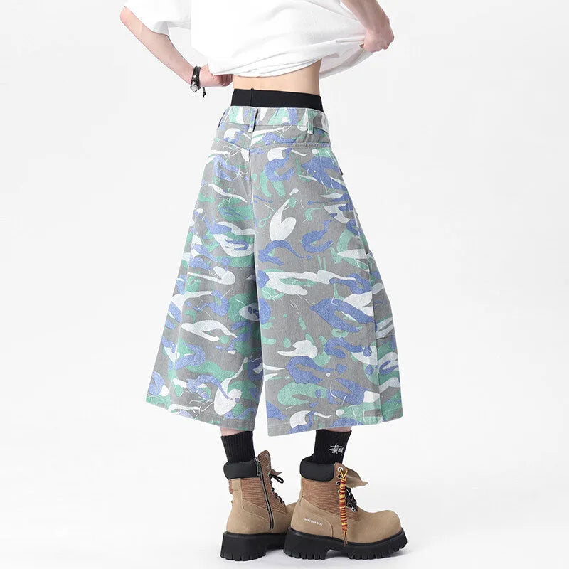 Camouflage pattern cotton cropped workwear trousers with straight leg and pockets on a mannequin