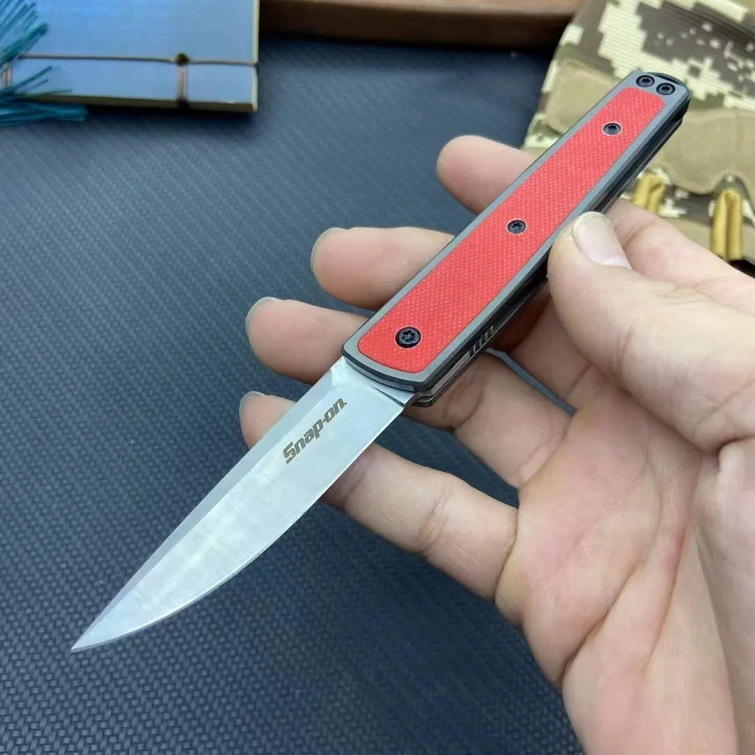 Folding fruit knife with stainless steel blade in black, brown, or red with measurements showing 17cm length