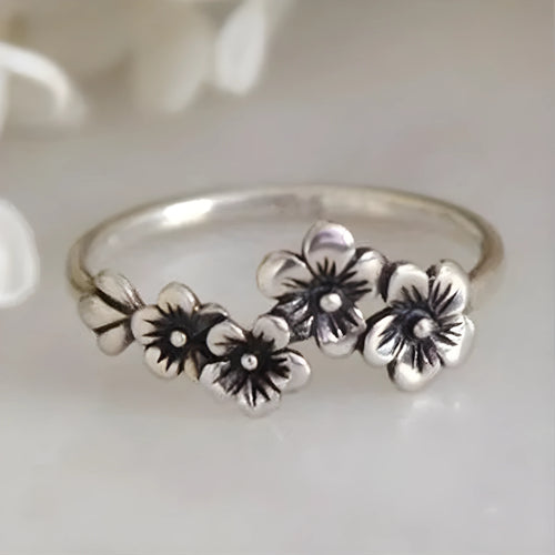 Antique silver alloy geometric ring with retro personality style on white background