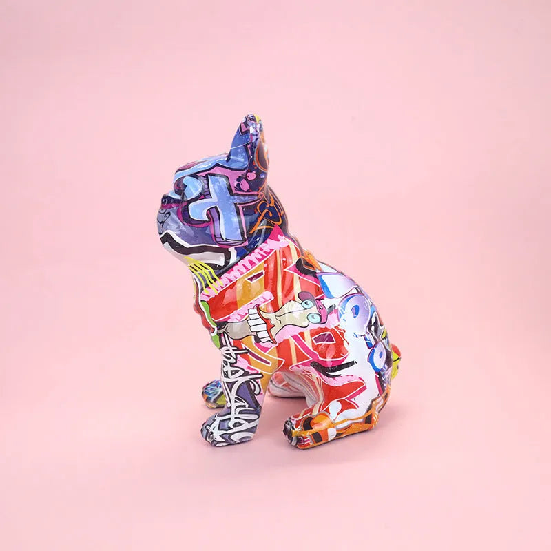 Graffiti-coloured resin French bulldog statue on a shelf