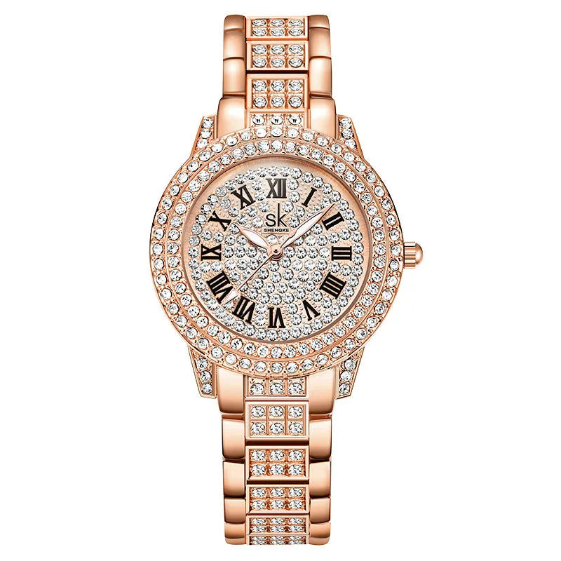 Women's gold alloy watch with diamond-like accents, slim 14mm strap, and 8mm dial on a white background