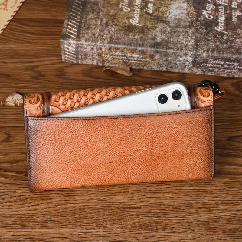 Retro brown tri-fold women's wallet with embossed floral pattern, showing card slots and folded profile.