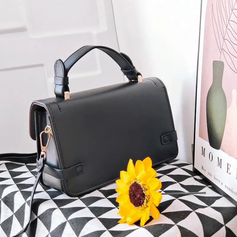 A retro-style apricot PU crossbody bag with a square shape, decorative stitching, and a visible file compartment inside.