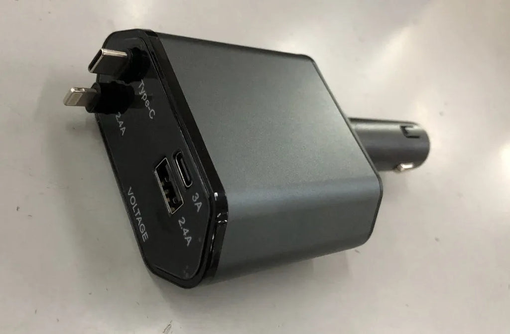 Automatic retractable cable car charger plugged into a vehicle cigarette lighter socket.