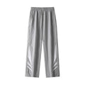 A pair of black straight-leg men's casual trousers on a hanger, showing the mid-rise waist and non-ironing fabric texture.