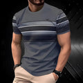 Man wearing a loose fit grey short sleeve polyester T-shirt on a casual summer day.