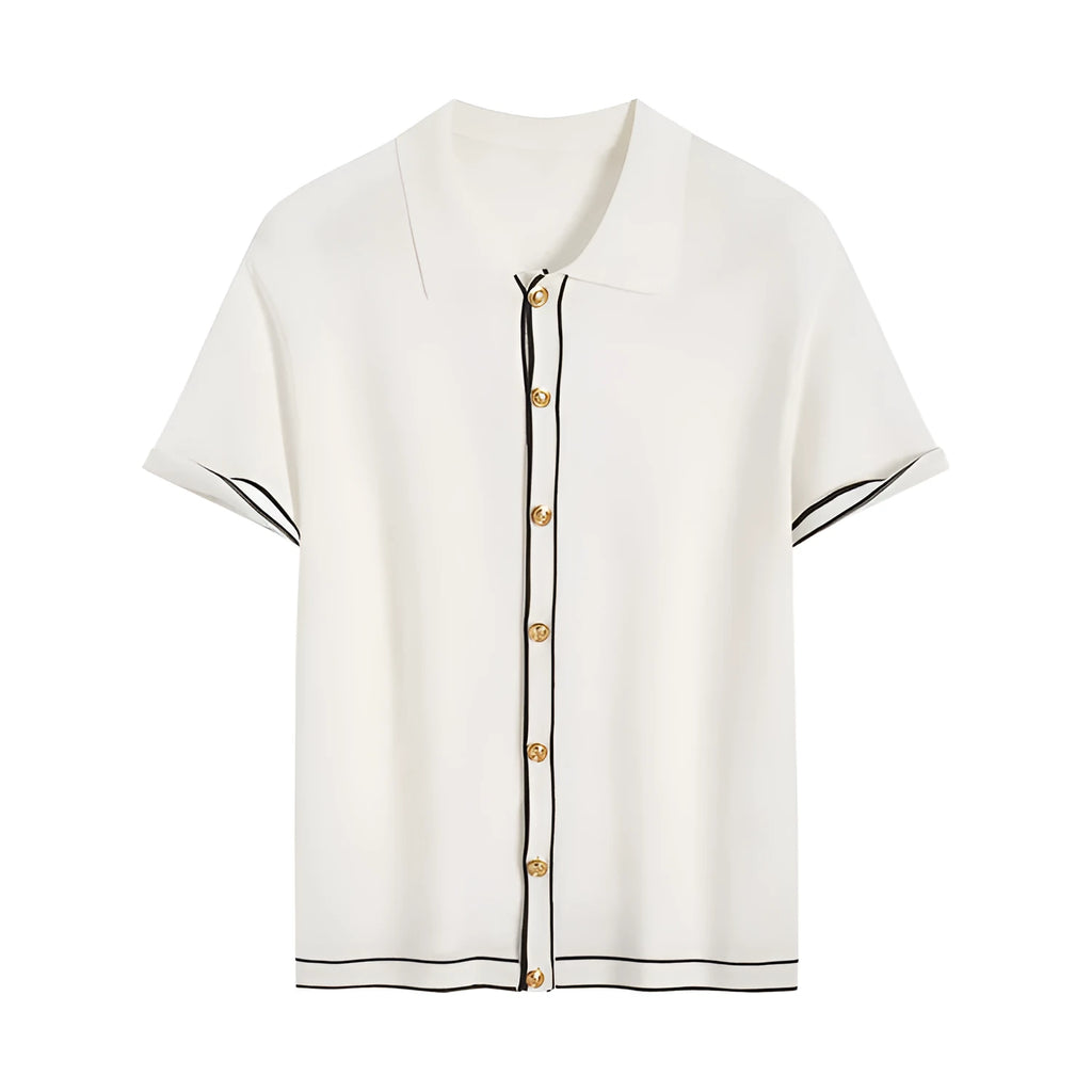White short-sleeve cardigan with dark contrast colour lapels, buttoned front, on a hanger.