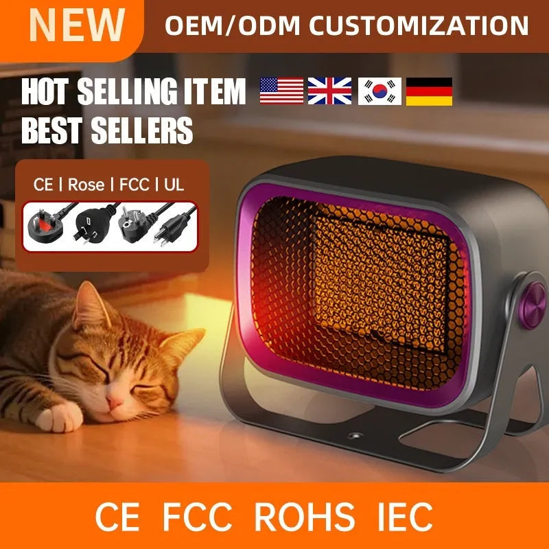 A compact grey desktop ceramic electric heater with a rotatable base on a wooden desk.