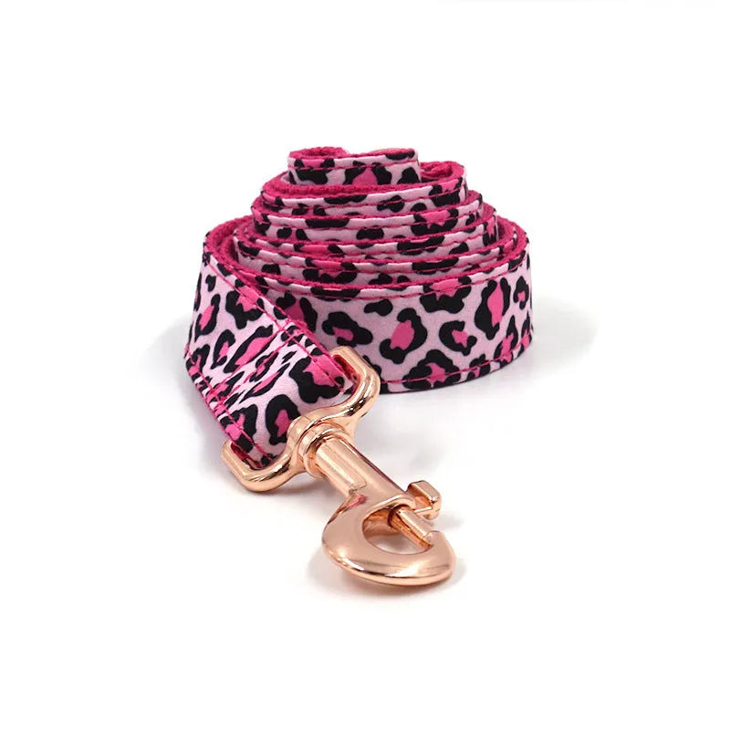 Leopard print rose gold dog collar and leash set on a white background, showing collar and attached leash