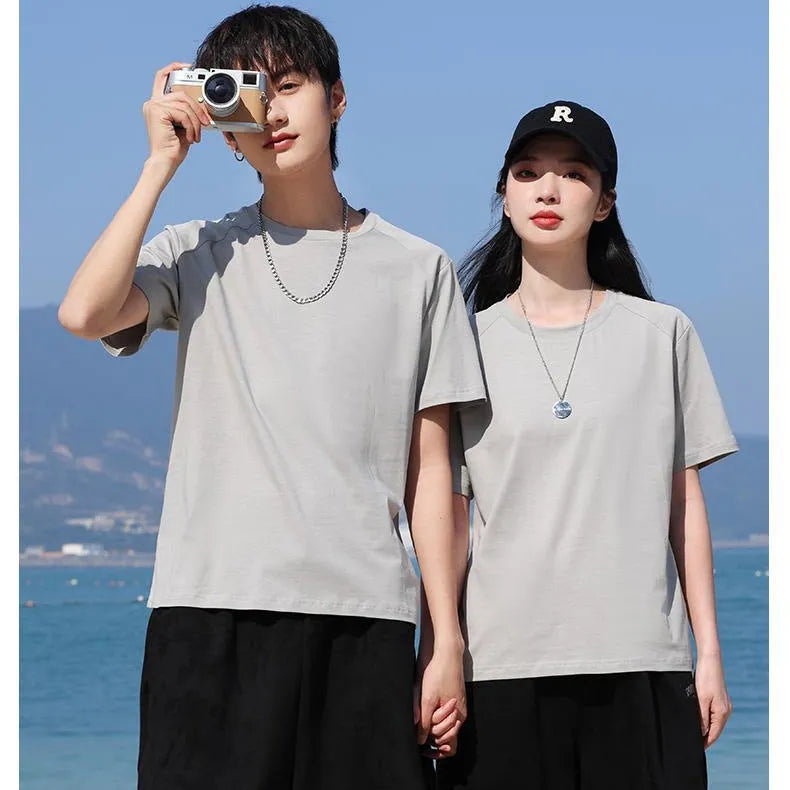 A man's pure cotton solid colour short sleeve T-shirt laid flat, showing its straight cut.
