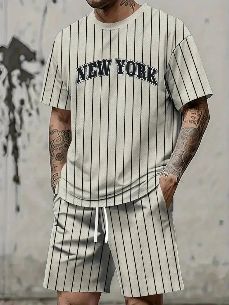 Men's grey 3D printed letter pattern sports suit consisting of a short sleeve top and matching shorts on a hanger