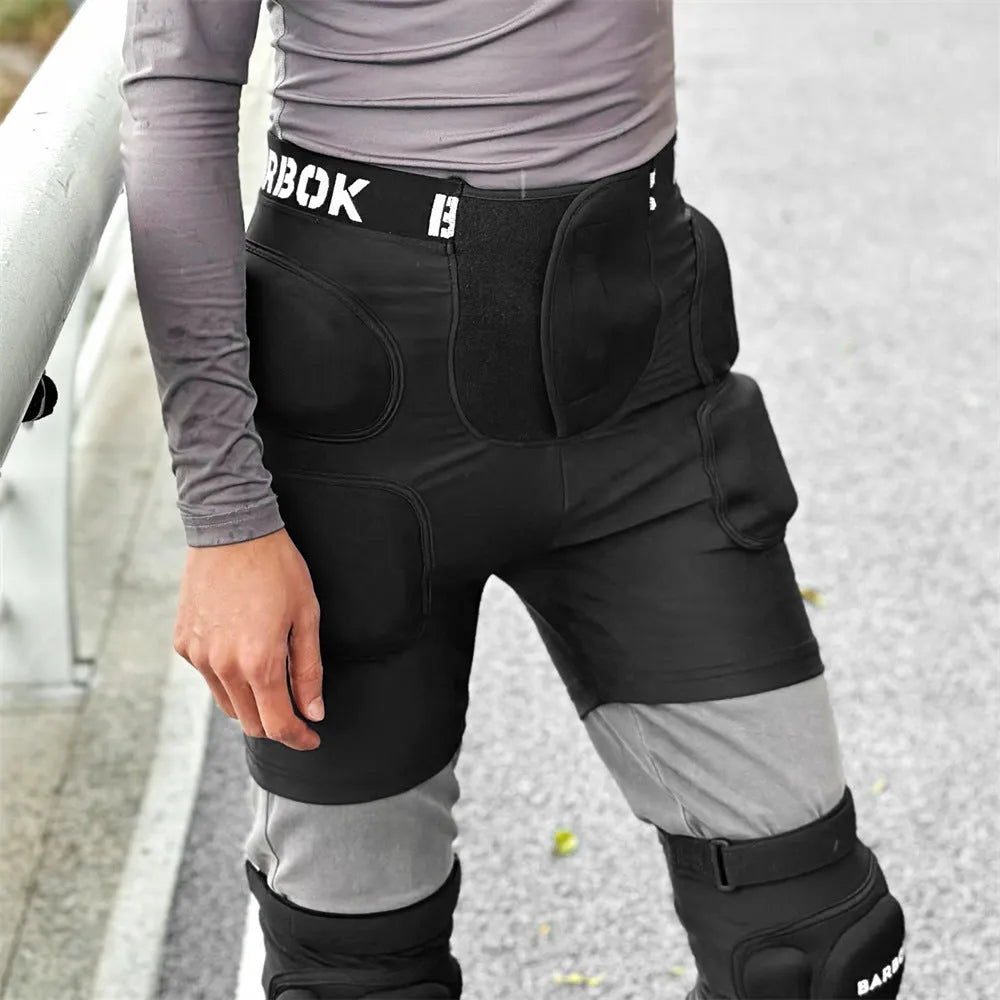 Black adult hip protection pad with NBR padding for skating and skiing safety.