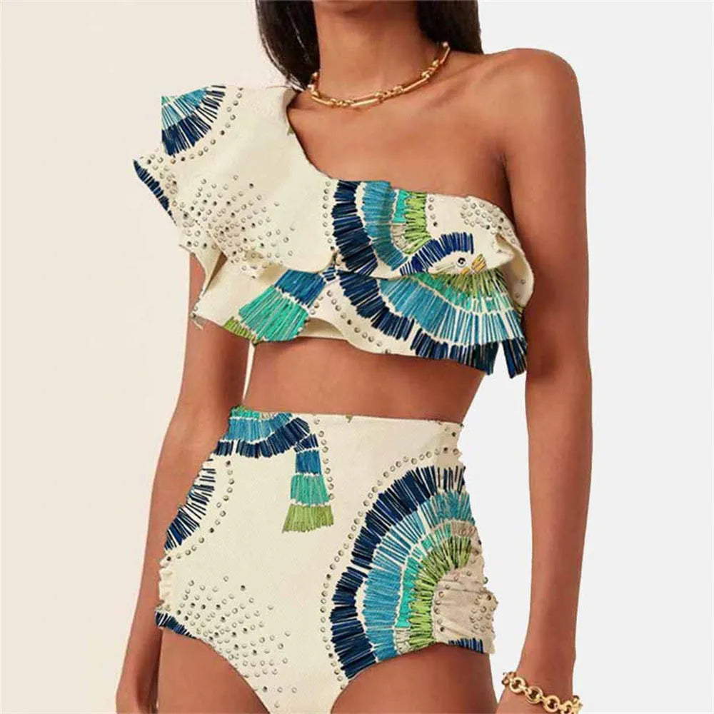 White women's one-shoulder swimsuit with lotus leaf trim and high-leg split.