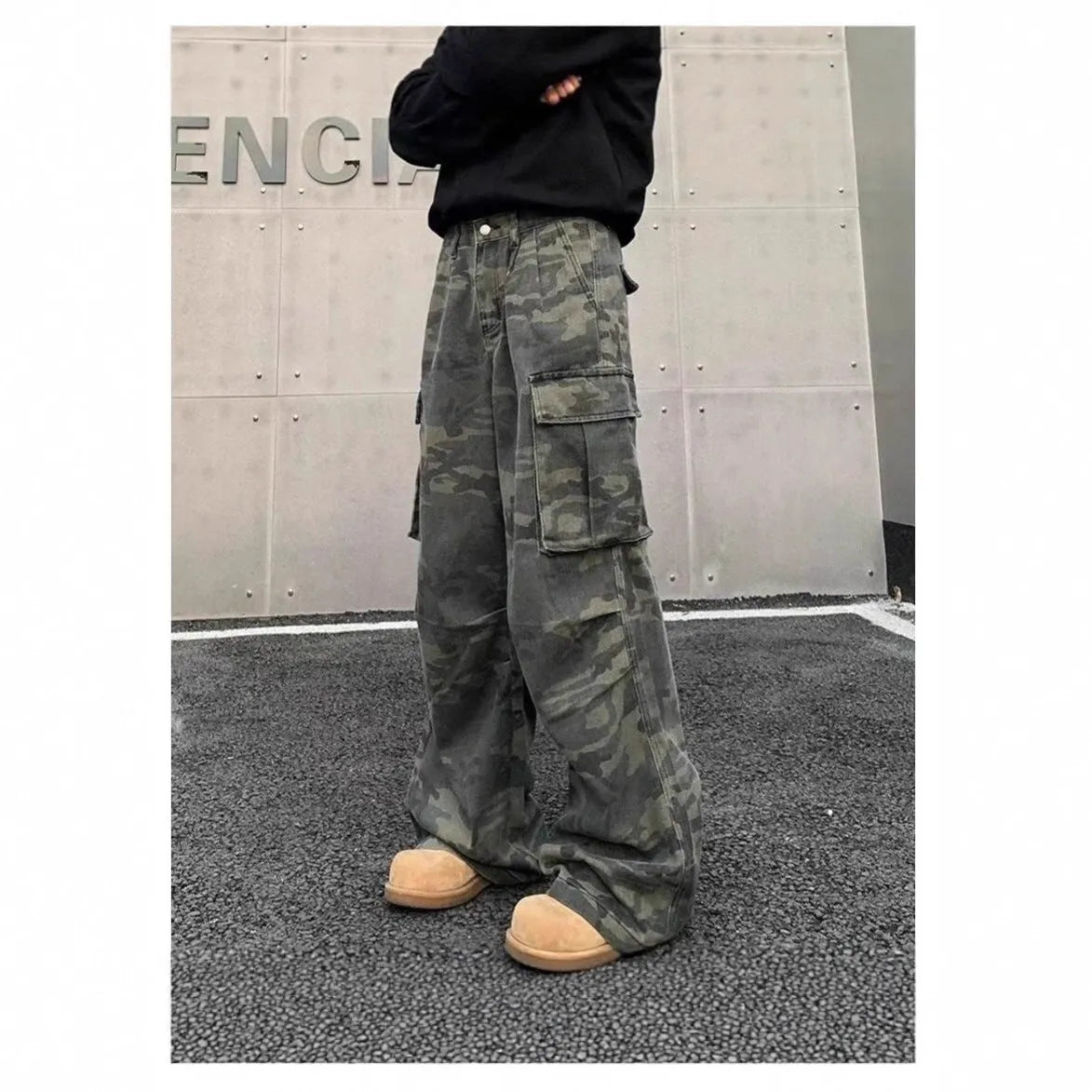 American vintage style crumpled camouflage cargo pants with multiple pockets on a mid-waist fit.