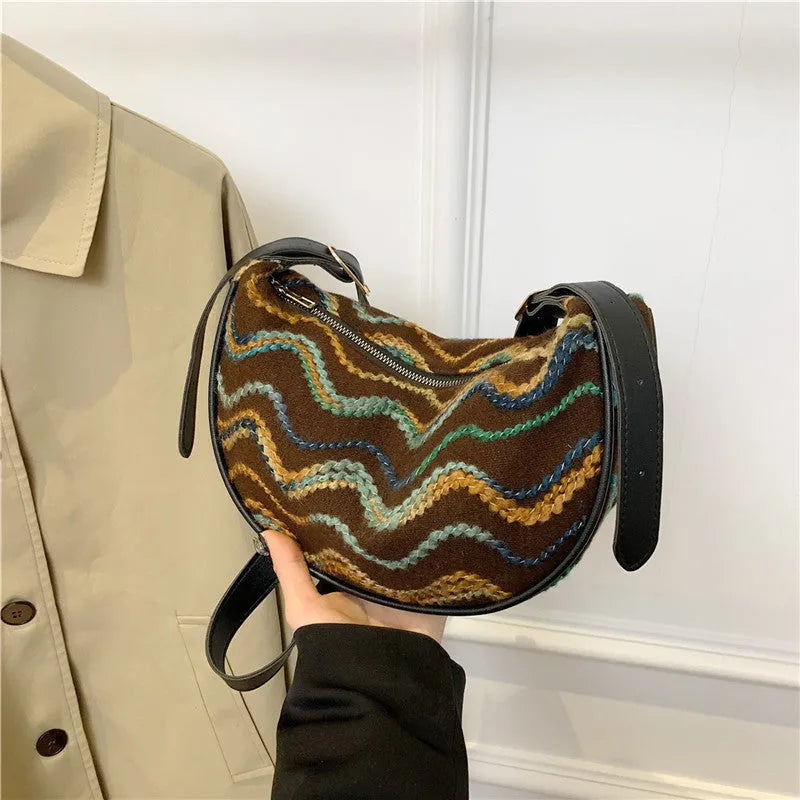 Women's woven straw crossbody bag with internal phone compartment and file storage