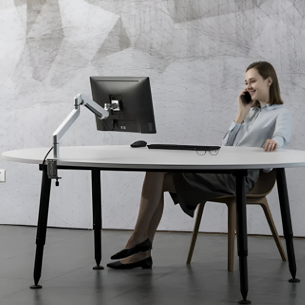 Silver aluminium alloy hover notebook air pressure arm bracket holding a laptop