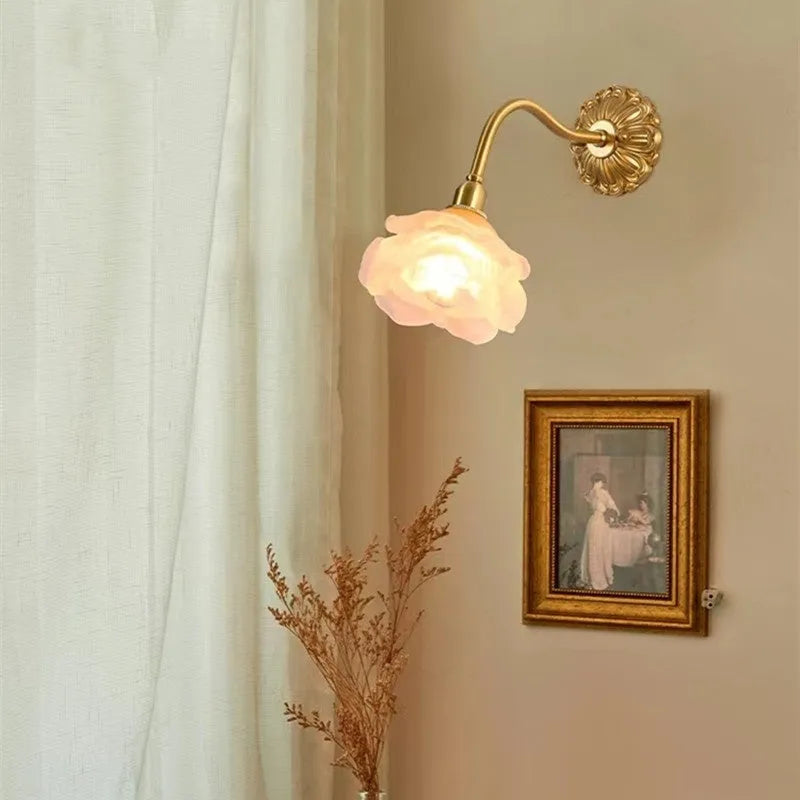 Retro copper wall lamp with frosted glass shade and warm LED light mounted on a bedroom wall