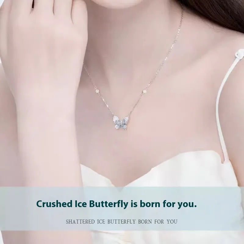 Bingyu adjustable silver butterfly necklace on a dark background, showing the icy electroplated pendant and O-ring chain.