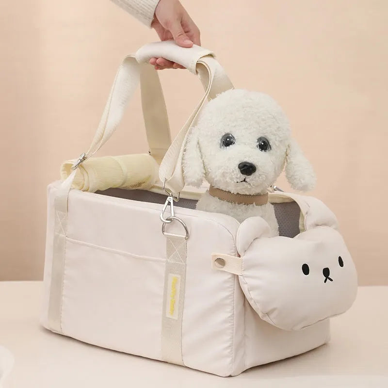 Soft beige polyester pet carrier bag with cartoon pattern for small cats and dogs