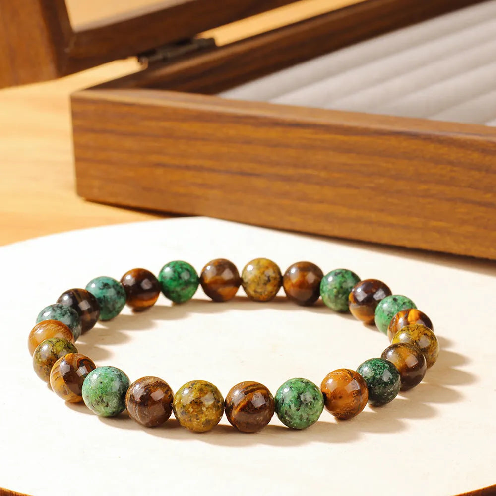 Handmade Tigereye fortune bracelet with natural stone and antique flower design in L1805 colour.