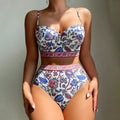 Blue women's high-waist push-up bikini swimsuit with sleeveless design