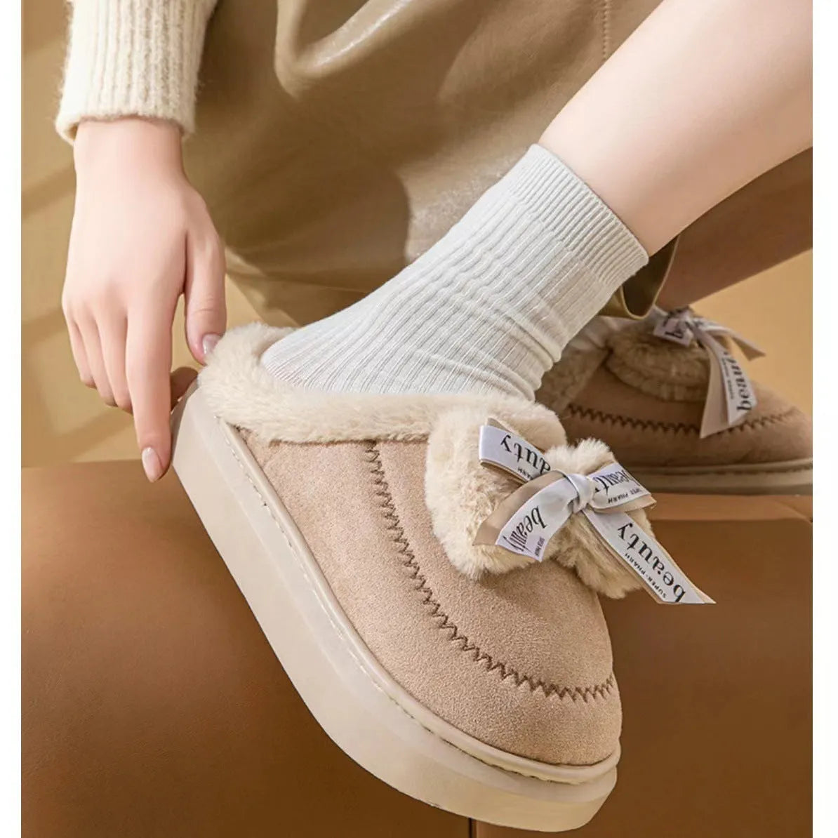 Beige suede women's half slippers with a ribbon bow and thick EVA sole.