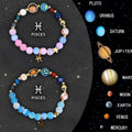 Set of twelve beaded bracelets with natural stones, each representing a different zodiac sign, laid flat.