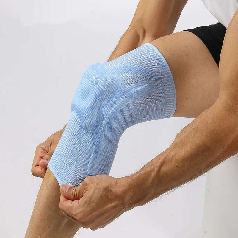 Sports knee pad in black and grey, black and blue, or light blue, sizes S to XL for running and outdoor use
