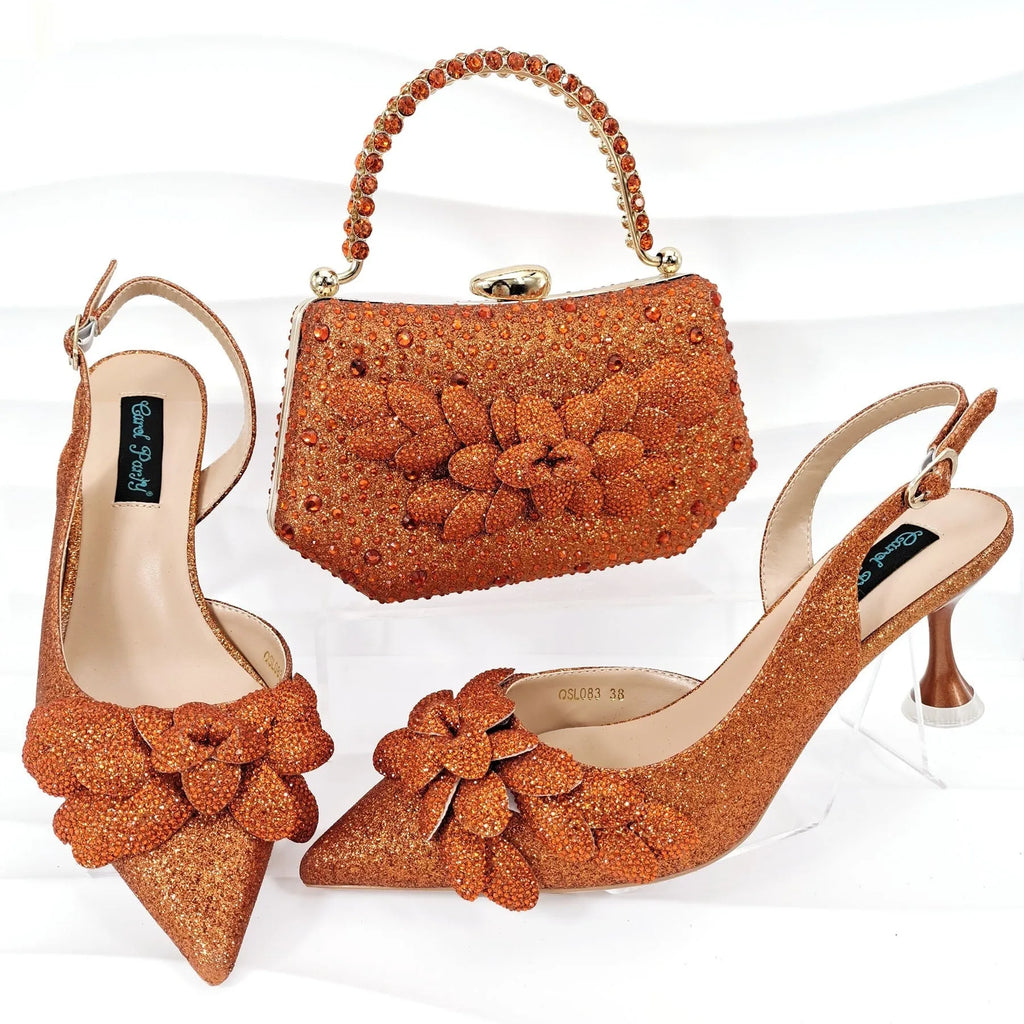 Party shoes and bag set with wine glass heel, rhinestone decoration, and buckle fastening in silver colour