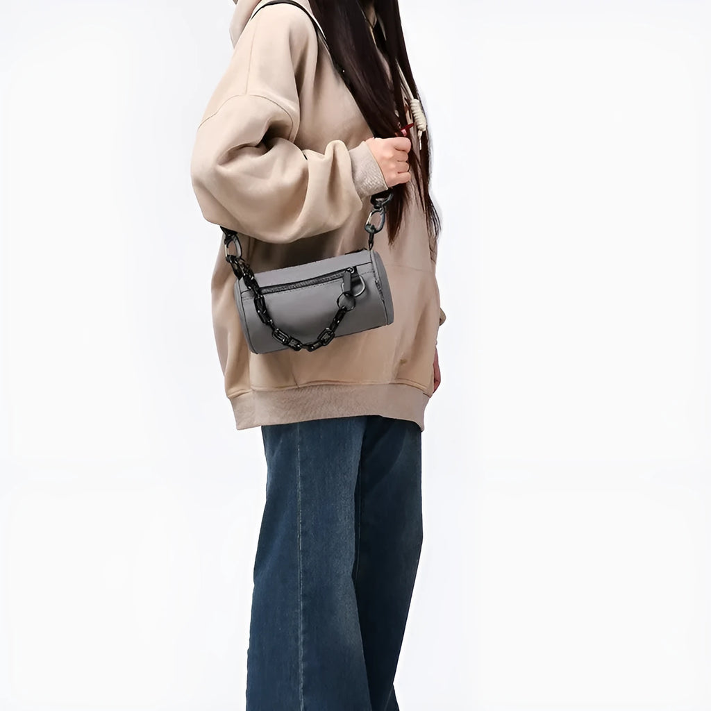 Waterproof Oxford cloth messenger crossbody bag with chain detailing in black, grey, or orange colours