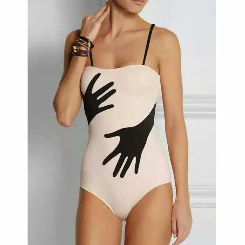 Women's one-piece bikini swimsuit with a gauze skirt, made from polyester fibre.