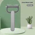 Green or grey handled dog detangling comb with stainless steel teeth, shown in small and large size options.