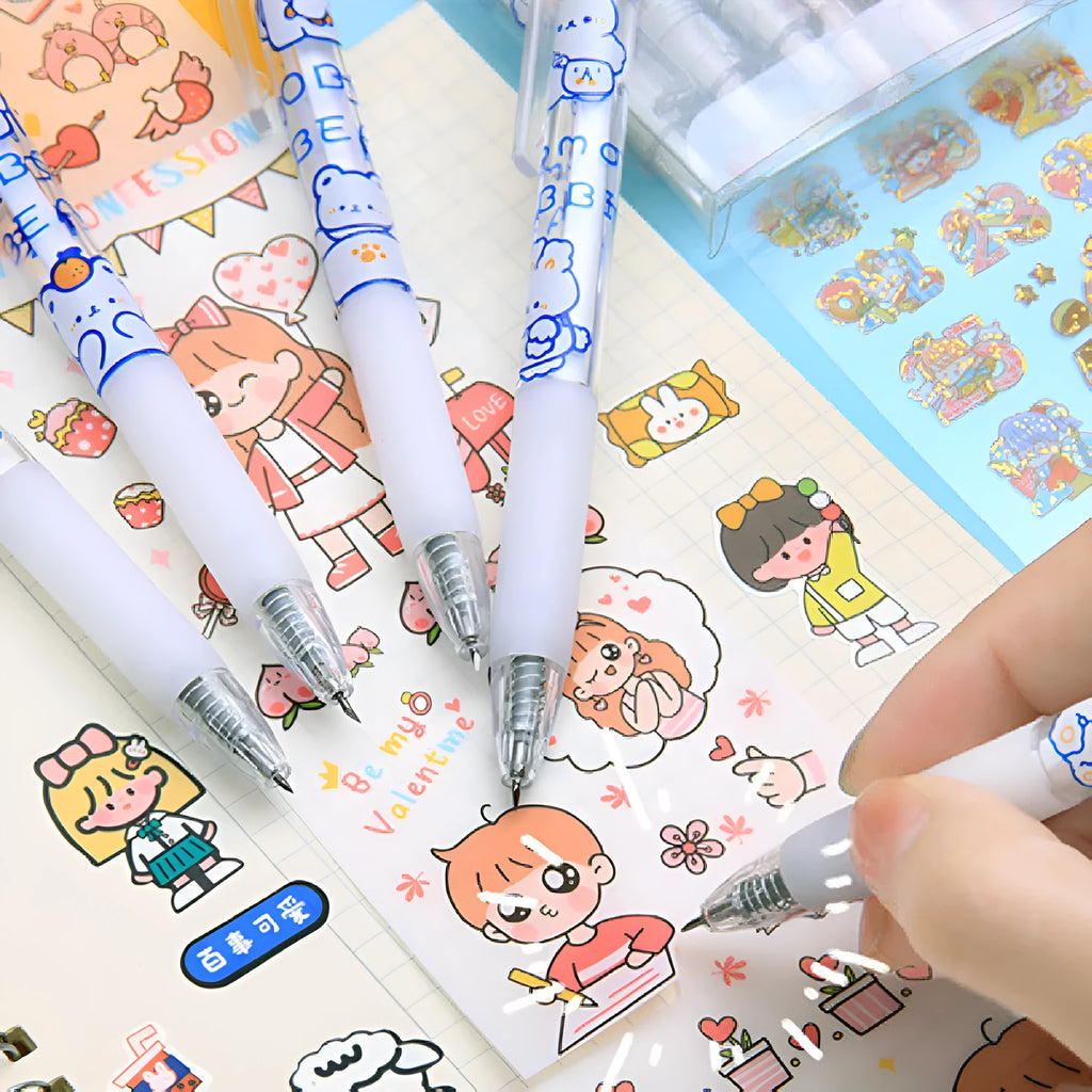 Set of six bear and rabbit themed plastic and metal press pen knives.