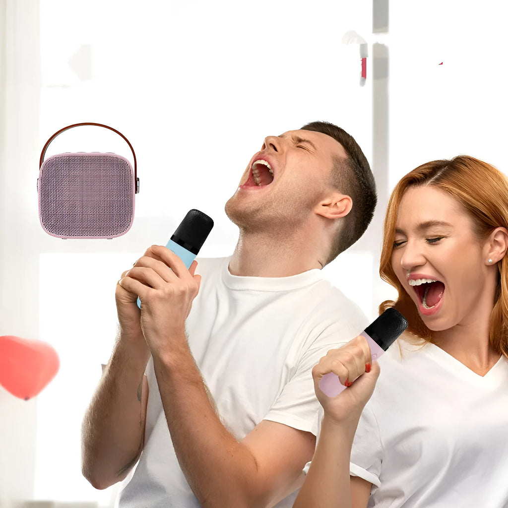 Compact white, pink, or blue wireless Bluetooth portable speaker with built-in microphone