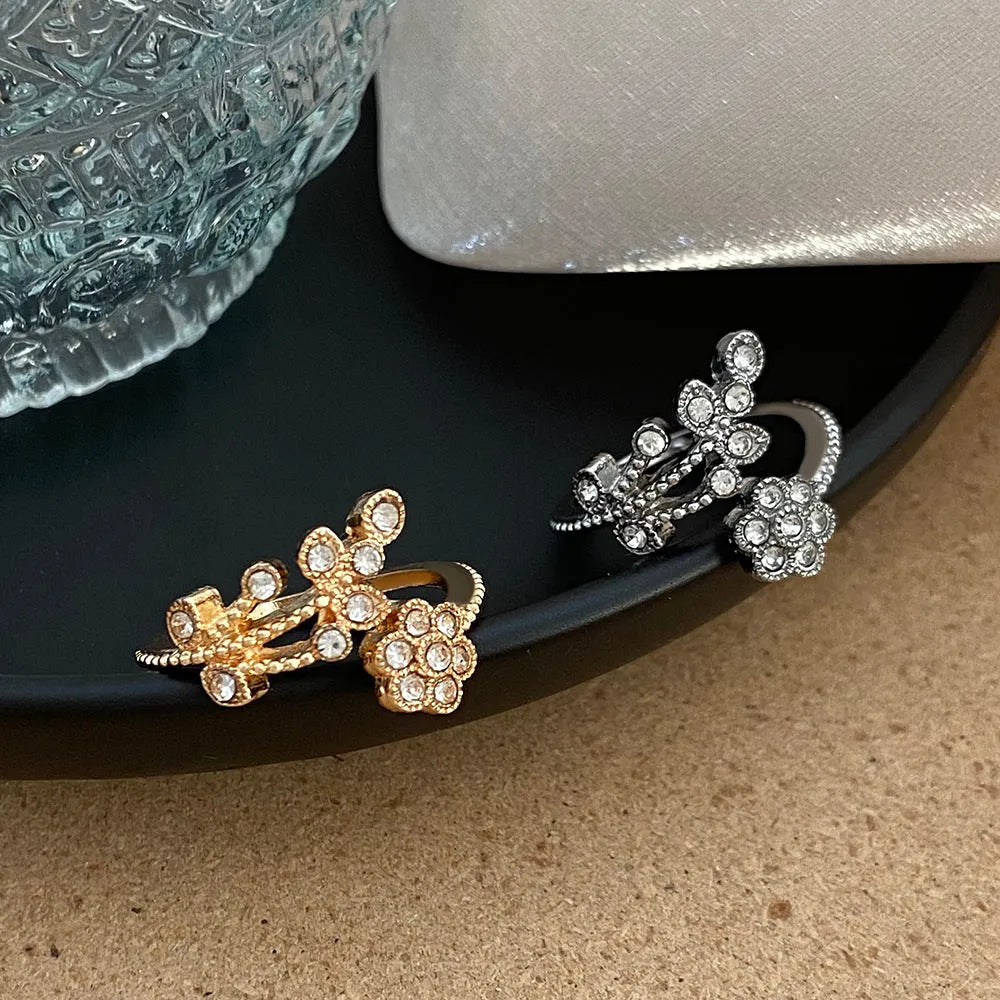 Women's copper open ring with floral leaf design in gold or white colour