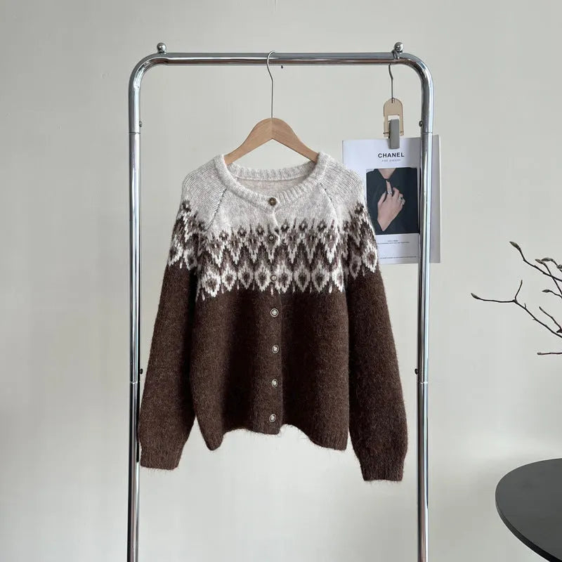 Women's beige jacquard knit sweater coat with a loose fit and long sleeves.