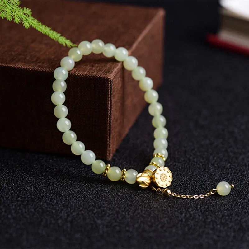 Natural Hetian Jade bracelet with lotus design and sunny water patterns