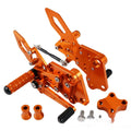 KTM DUKE motorcycle rear pedal support assembly bracket kit in black or orange