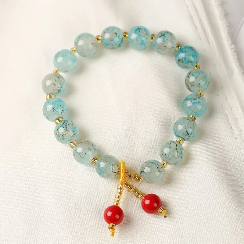 Women's ceramic woven bracelet with geometric crystal beads in five colours: brown, green, light blue, pink, purple