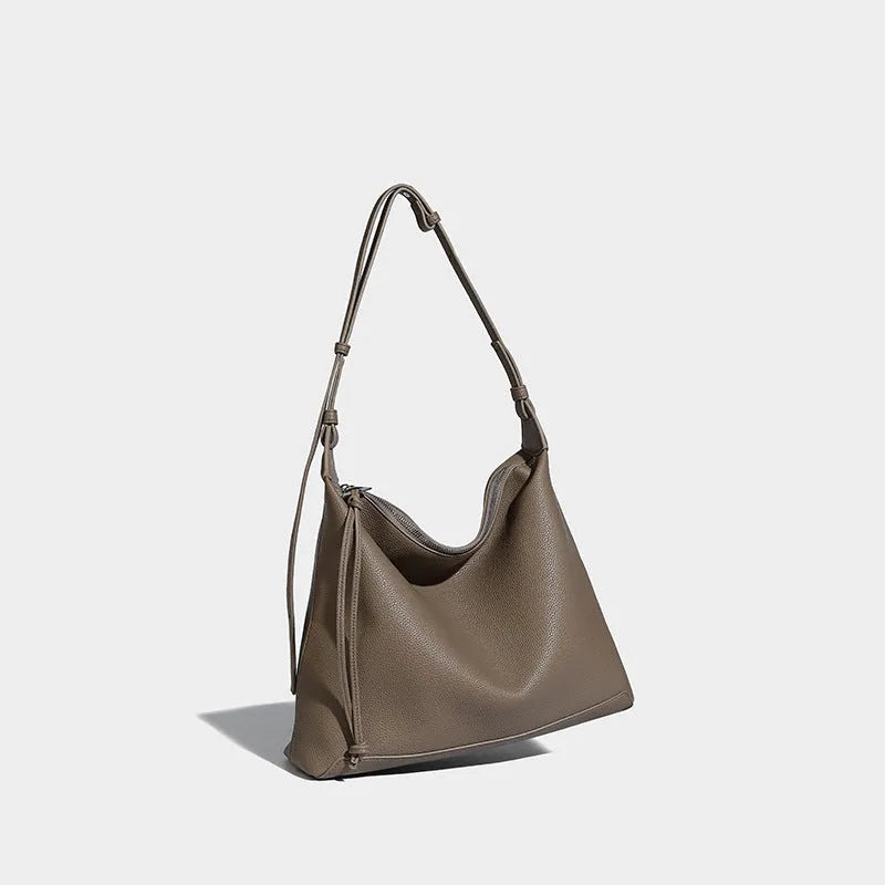Large capacity caramel coloured underarm shoulder messenger bag made from soft PU material
