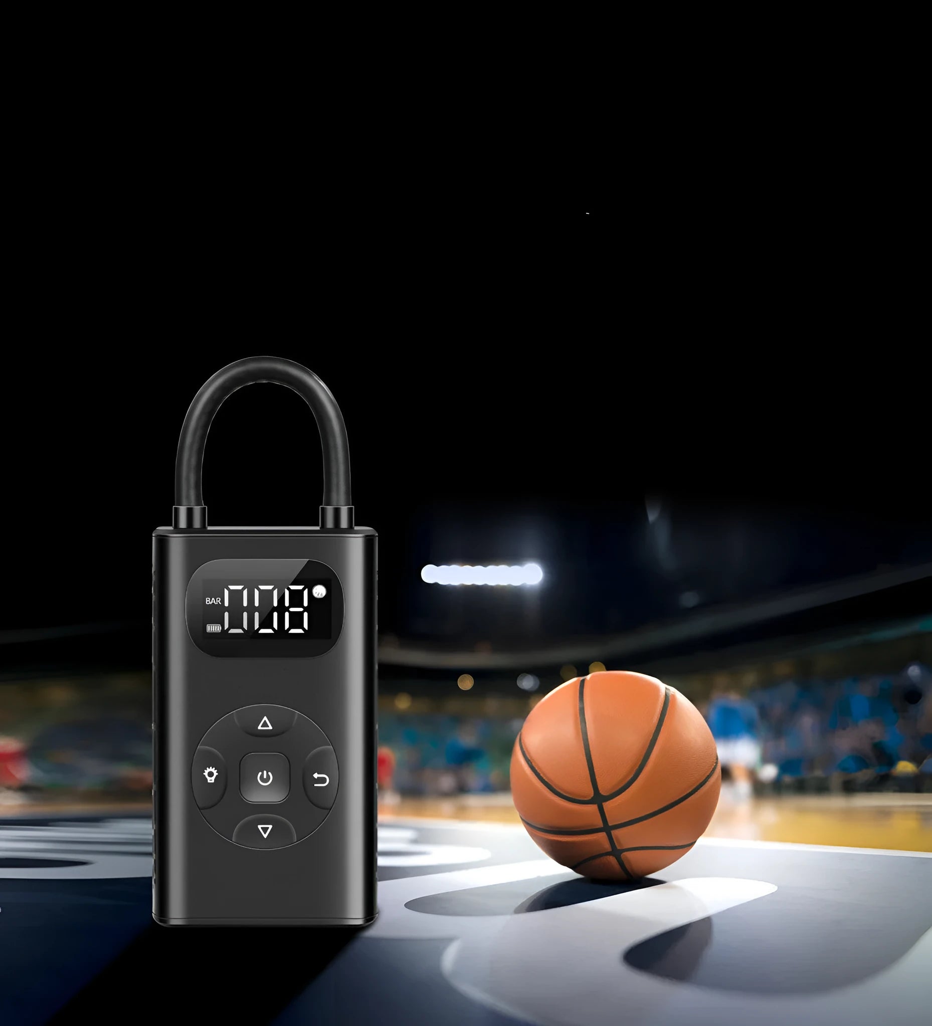 Black rectangular portable tyre inflator and power bank unit with a connected inflation hose on a table.