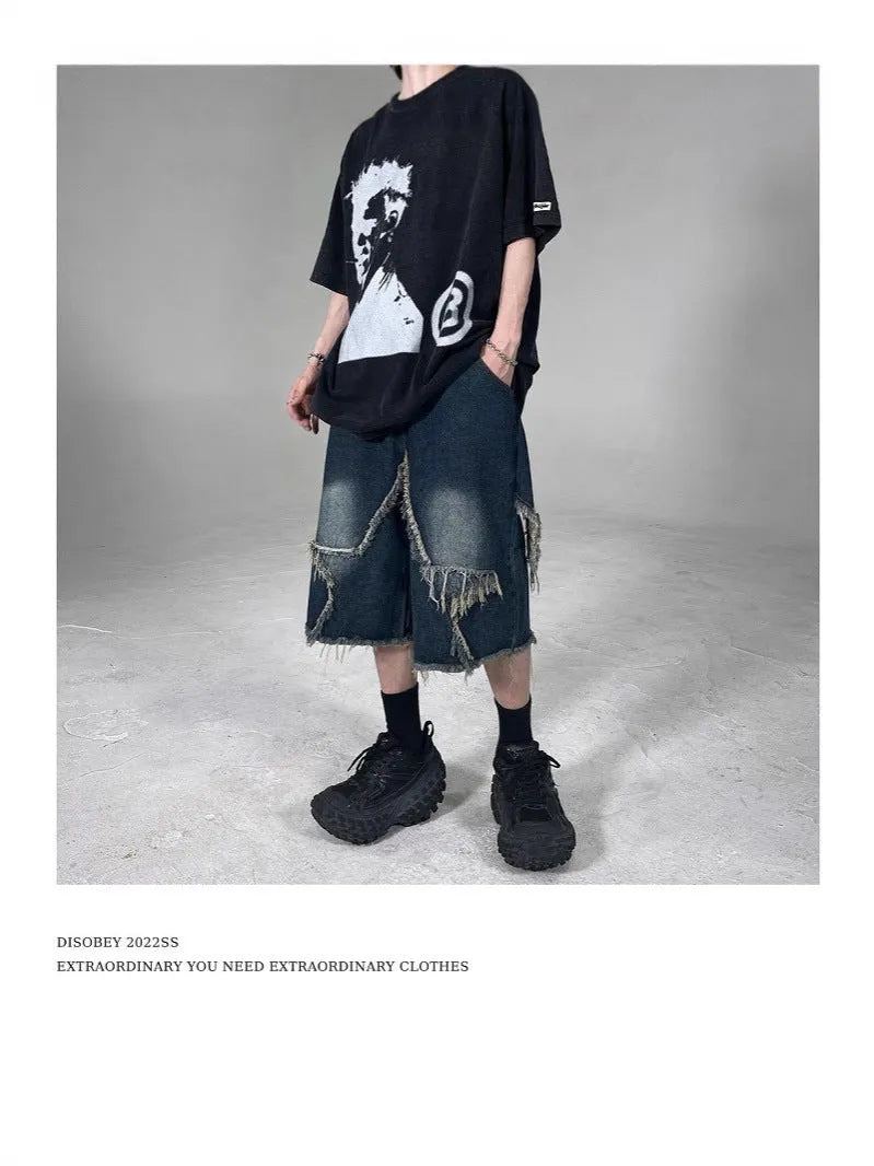 Blue retro denim shorts with frayed five-pointed star detail and loose fit design