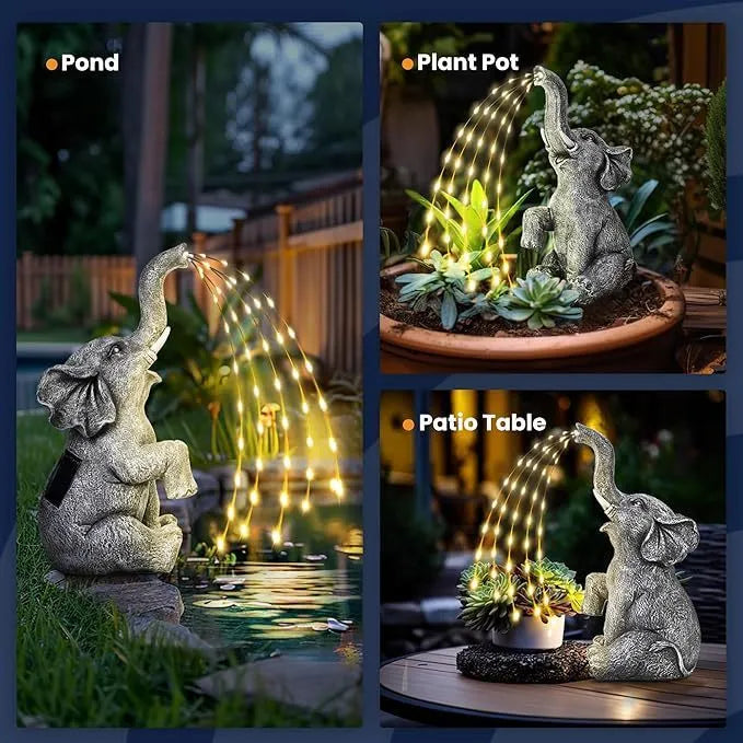 Resin elephant garden statue with integrated LED light strip outdoors.