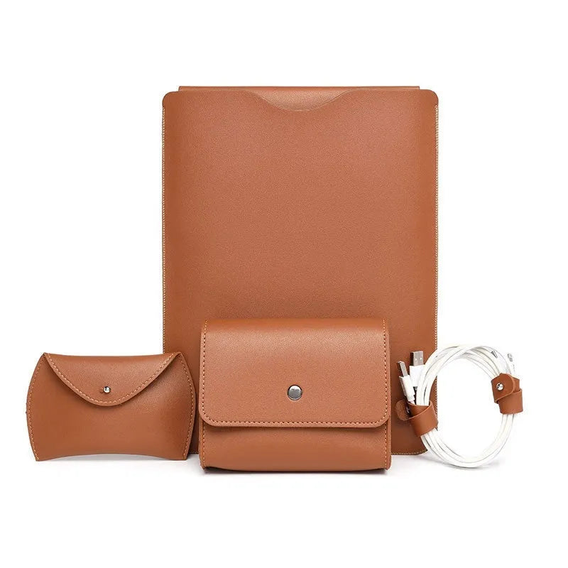 Set of four lock edge imitation leather protective covers for laptops in different colours.
