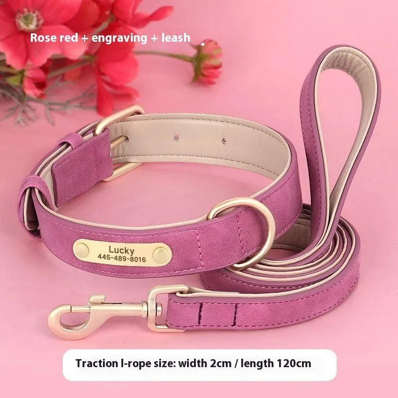 A rose red double-layer leather dog collar and matching traction rope laid flat.